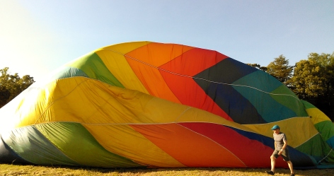 Clark's balloon continues to increase in size as two fans pump air into it.